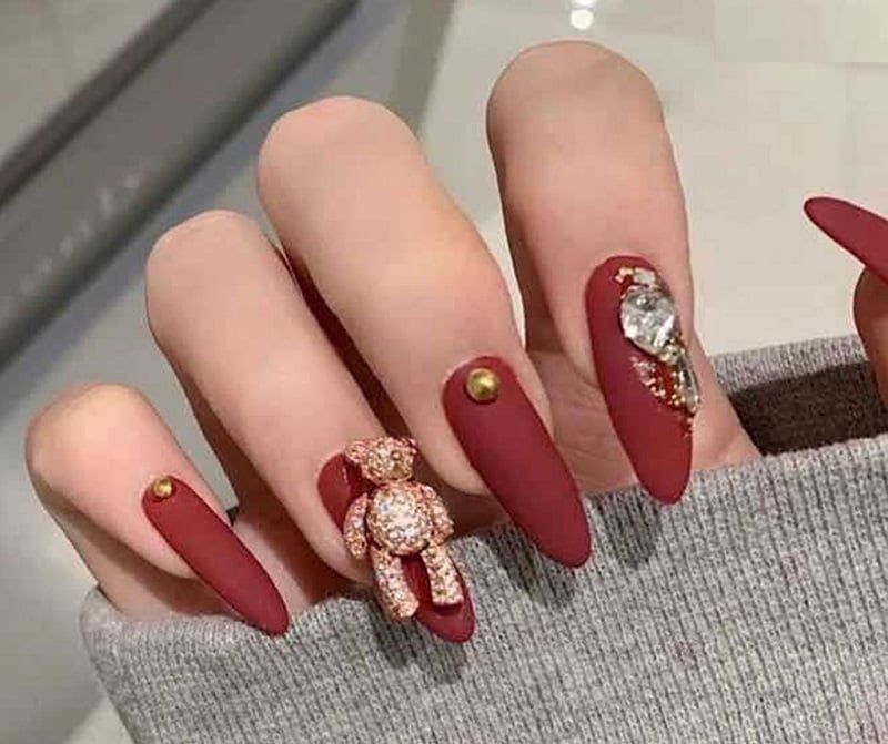 Những mẫu nail móng nhọn tròn tết - Hình số 7