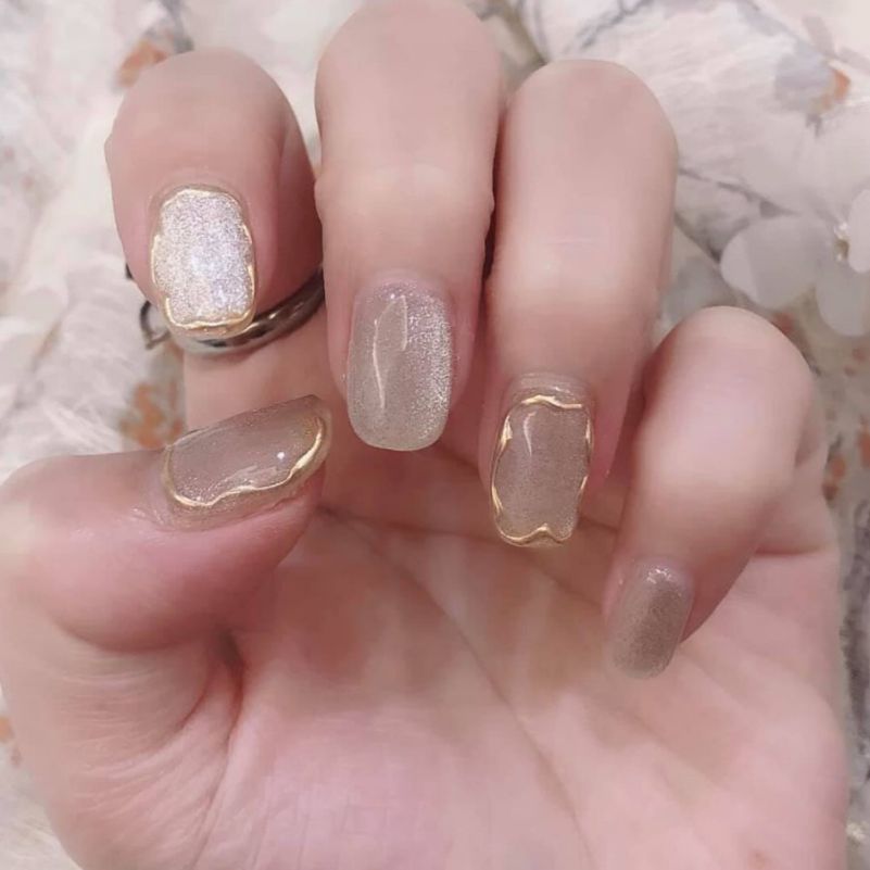 Những mẫu nail mắt mèo trắng sang chảnh - Hình số 1