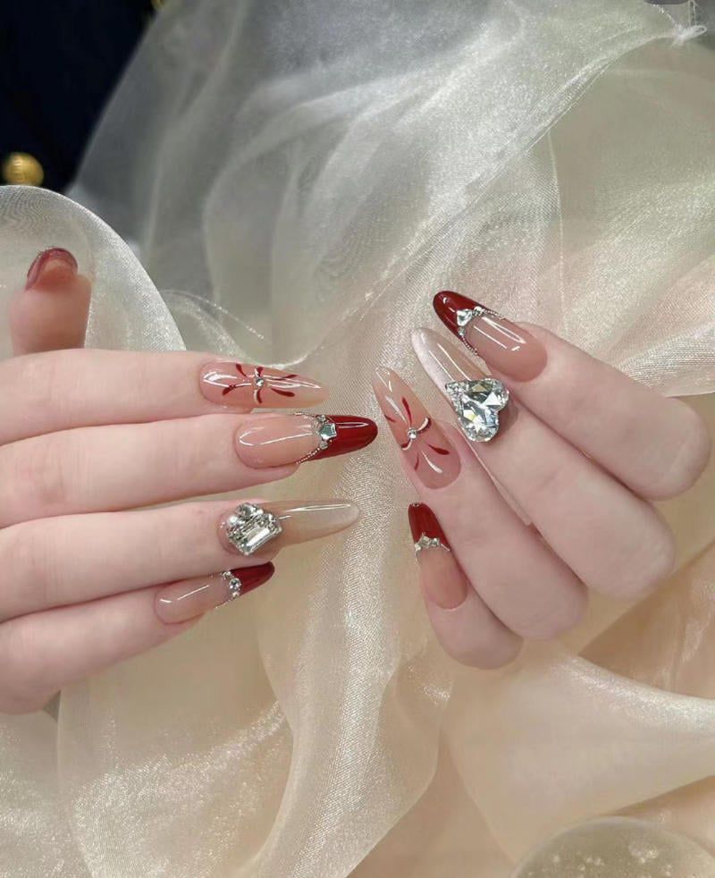 Những mẫu nail tết màu đỏ 2026 - Hình số 1