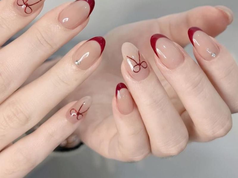 Những mẫu nail tết màu đỏ 2026 - Hình số 10