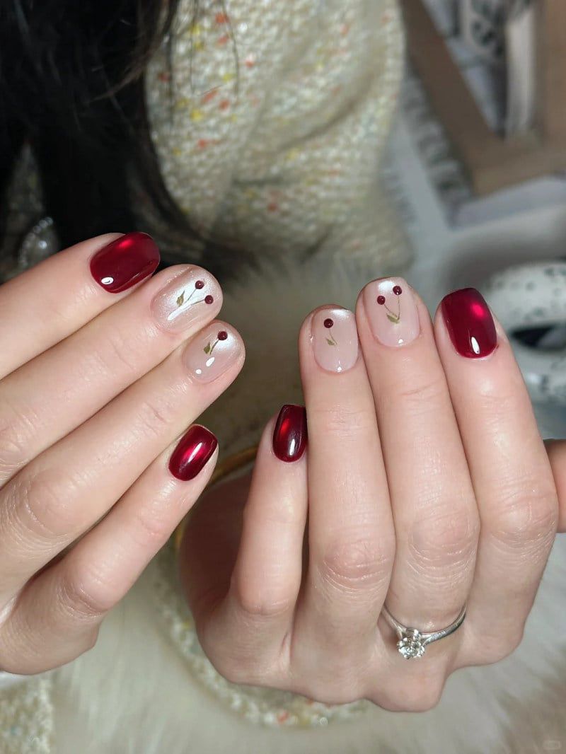Những mẫu nail màu đỏ cherry mắt mèo - Hình số 1