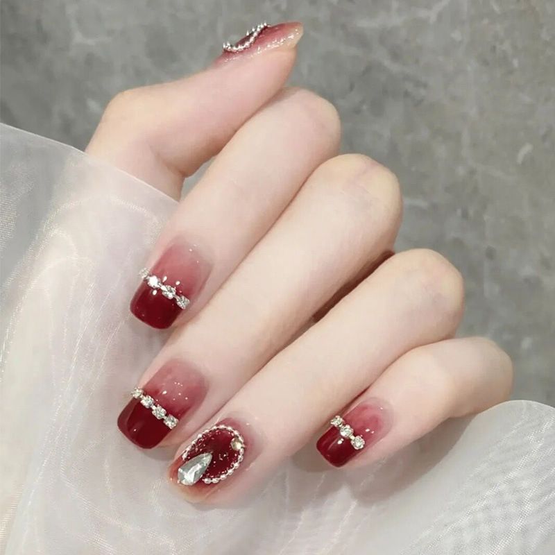 Những mẫu nail sơn thạch đính đá tết - Hình số 5