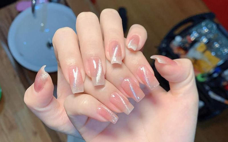 Những nail màu hồng pastel mắt mèo - Hình số 8